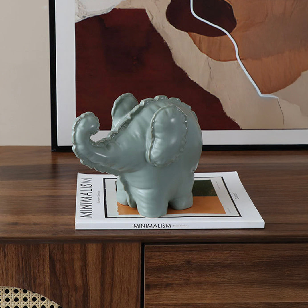 Funny Little Ceramic Elephant -A FD-D25075A -  Home Decor Figurines - ebarza Furniture UAE | Shop Modern Furniture in Abu Dhabi & Dubai - مفروشات ايبازرا في الامارات | تسوق اثاث عصري وديكورات مميزة في دبي وابوظبي