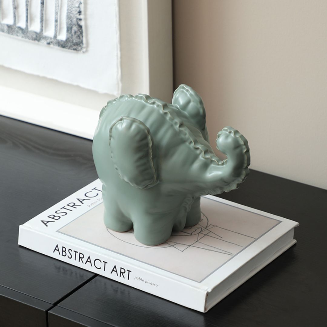 Funny Little Ceramic Elephant -A FD-D25075A -  Home Decor Figurines - ebarza Furniture UAE | Shop Modern Furniture in Abu Dhabi & Dubai - مفروشات ايبازرا في الامارات | تسوق اثاث عصري وديكورات مميزة في دبي وابوظبي