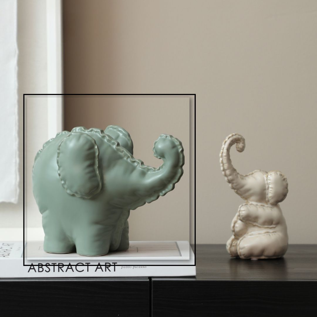 Funny Little Ceramic Elephant -A FD-D25075A -  Home Decor Figurines - ebarza Furniture UAE | Shop Modern Furniture in Abu Dhabi & Dubai - مفروشات ايبازرا في الامارات | تسوق اثاث عصري وديكورات مميزة في دبي وابوظبي