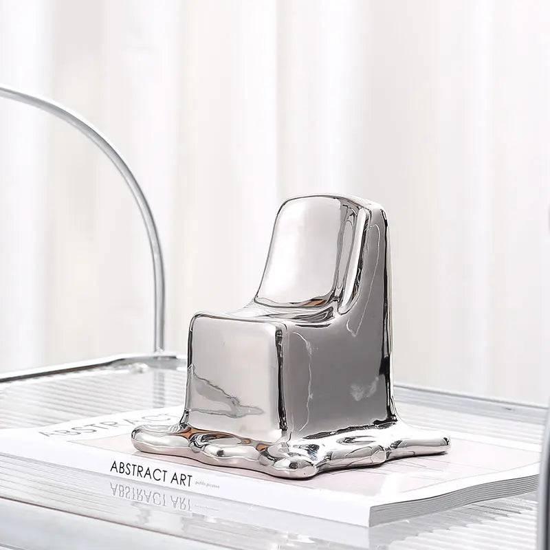 Silver Ceramic Chair Sculpture Fd-D22036 -  Home Decor Figurines | نحت كرسي سيراميك فضي - ebarza Furniture UAE | Shop Modern Furniture in Abu Dhabi & Dubai - مفروشات ايبازرا في الامارات | تسوق اثاث عصري وديكورات مميزة في دبي وابوظبي