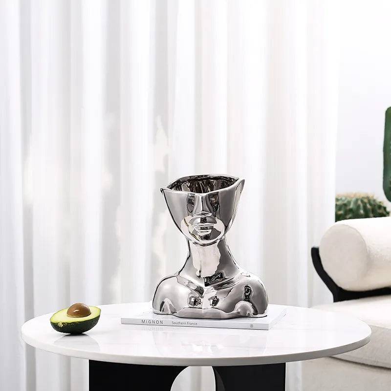 Silver Ceramic Figurative Sculpture Fa-D22038 -  Home Decor Figurines | نحت تصويري من السيراميك الفضي - ebarza Furniture UAE | Shop Modern Furniture in Abu Dhabi & Dubai - مفروشات ايبازرا في الامارات | تسوق اثاث عصري وديكورات مميزة في دبي وابوظبي