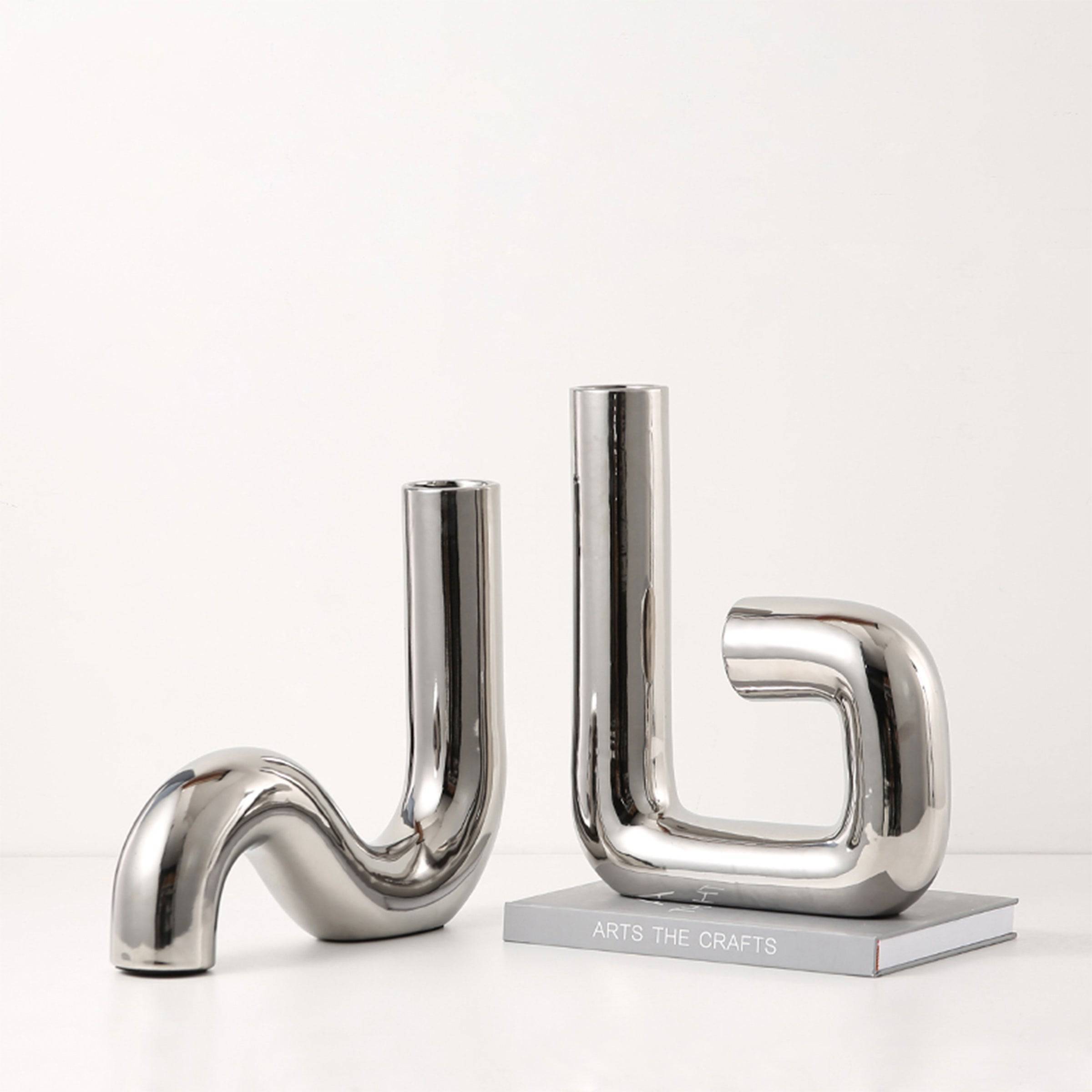 Silver Curved Ornament Fa-D21109-A -  Vases | مزهرية فضية منحنية - ebarza Furniture UAE | Shop Modern Furniture in Abu Dhabi & Dubai - مفروشات ايبازرا في الامارات | تسوق اثاث عصري وديكورات مميزة في دبي وابوظبي