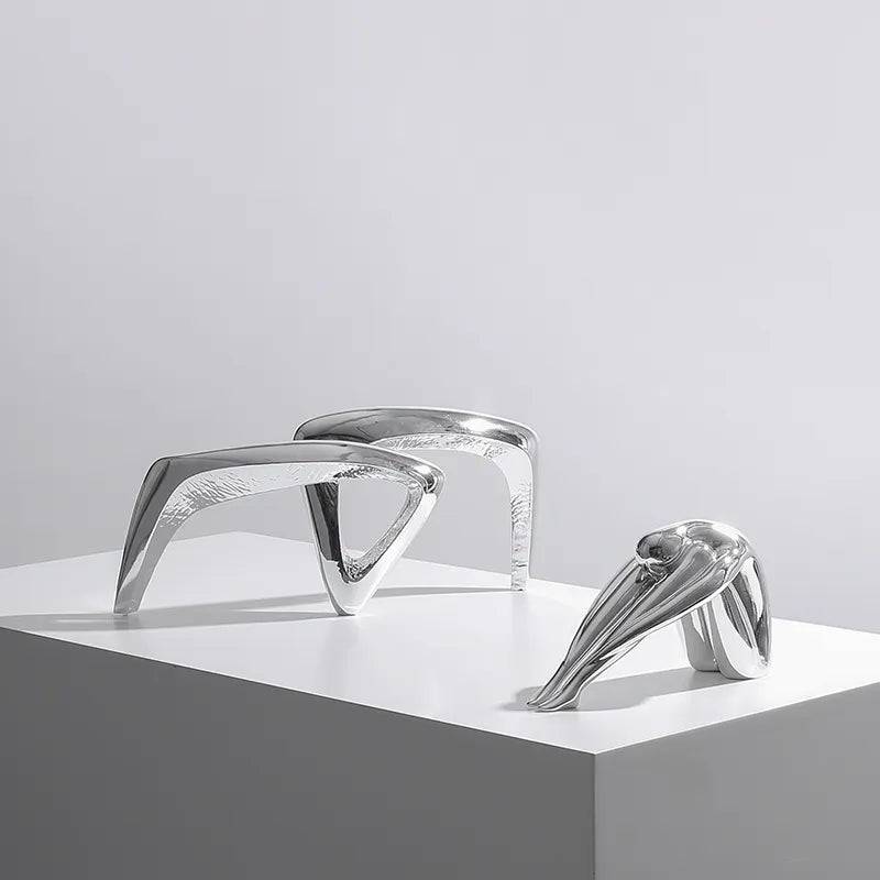 Silver Resin Abstract Sculpture Fc-Sz22031 -  Home Decor Figurines | النحت المجرد من الراتنج الفضي - ebarza Furniture UAE | Shop Modern Furniture in Abu Dhabi & Dubai - مفروشات ايبازرا في الامارات | تسوق اثاث عصري وديكورات مميزة في دبي وابوظبي